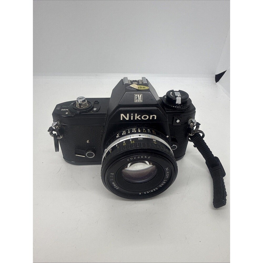 Vintage Nikon EM Black SLR Film Camera with Nikon Lens